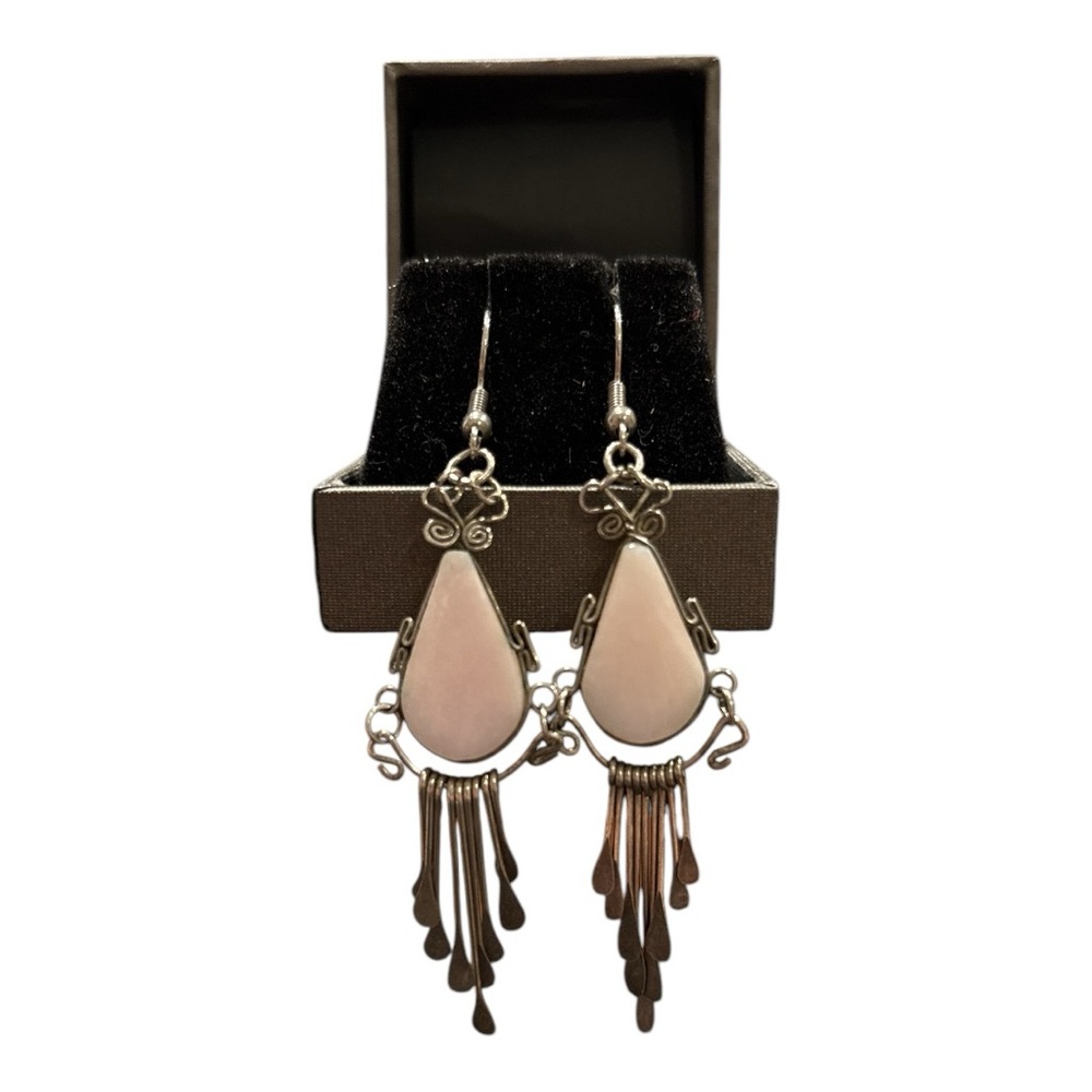 Native American inspired Silvertone earrings with pink stone. JB1